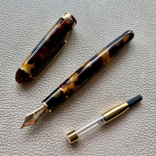 Platinum Tortoise Celluloid with Gold Plated trim Fountain Pen 14k Gold nib Discontinued